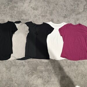 6 lululemon tee shirts.